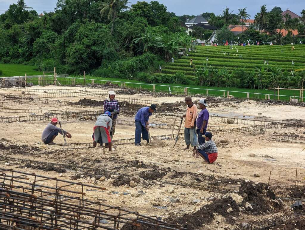 Indonesian construction workers on a construction site in Canggu.