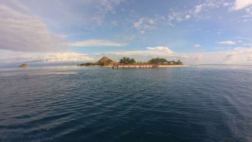 Approaching Kenawa Island by boat showing the surrounding