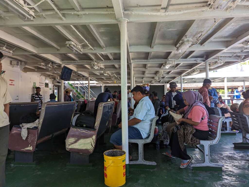 Outdoor seating area on the ferry from Bali to Lombok