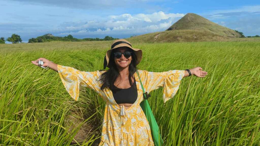 Ika posing on Kenawa Island in green grass