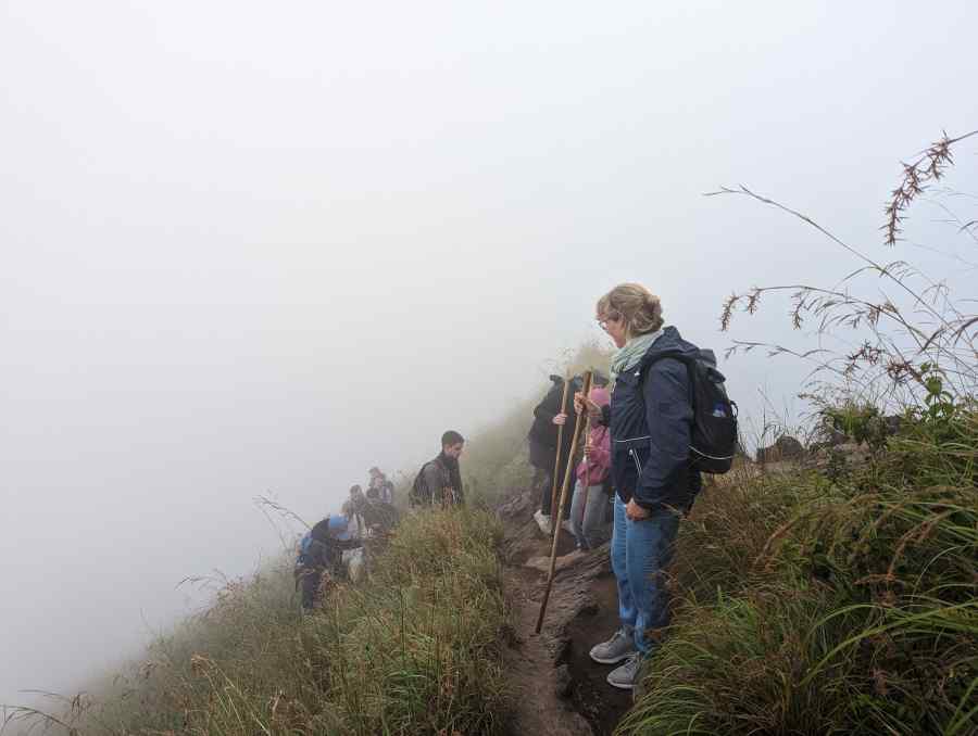 Climbing up Mount Batur in the fog